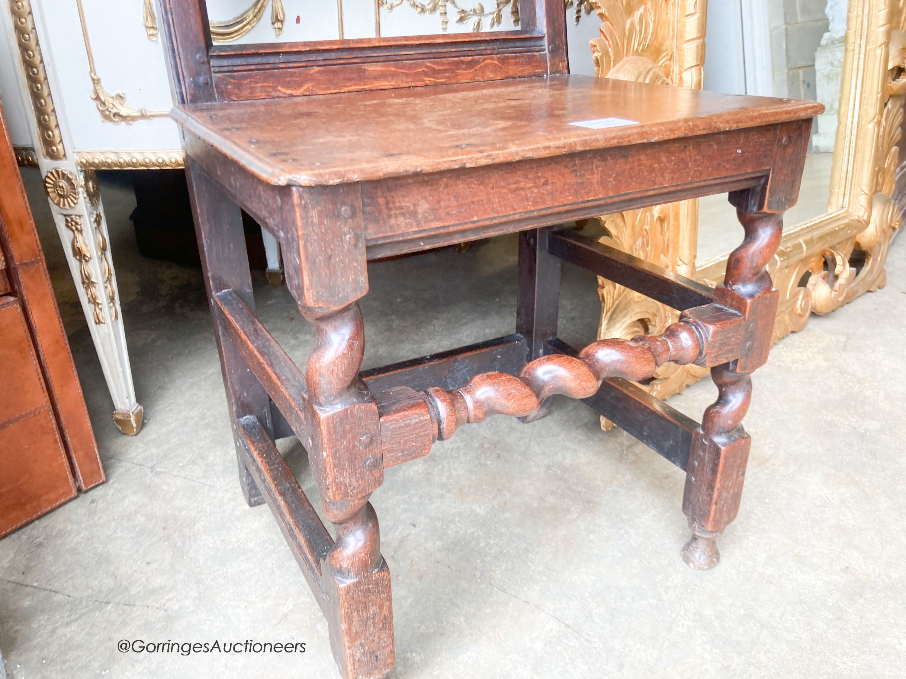 A late 17th century oak back stool, length 46cm, depth 38cm, height 91cm